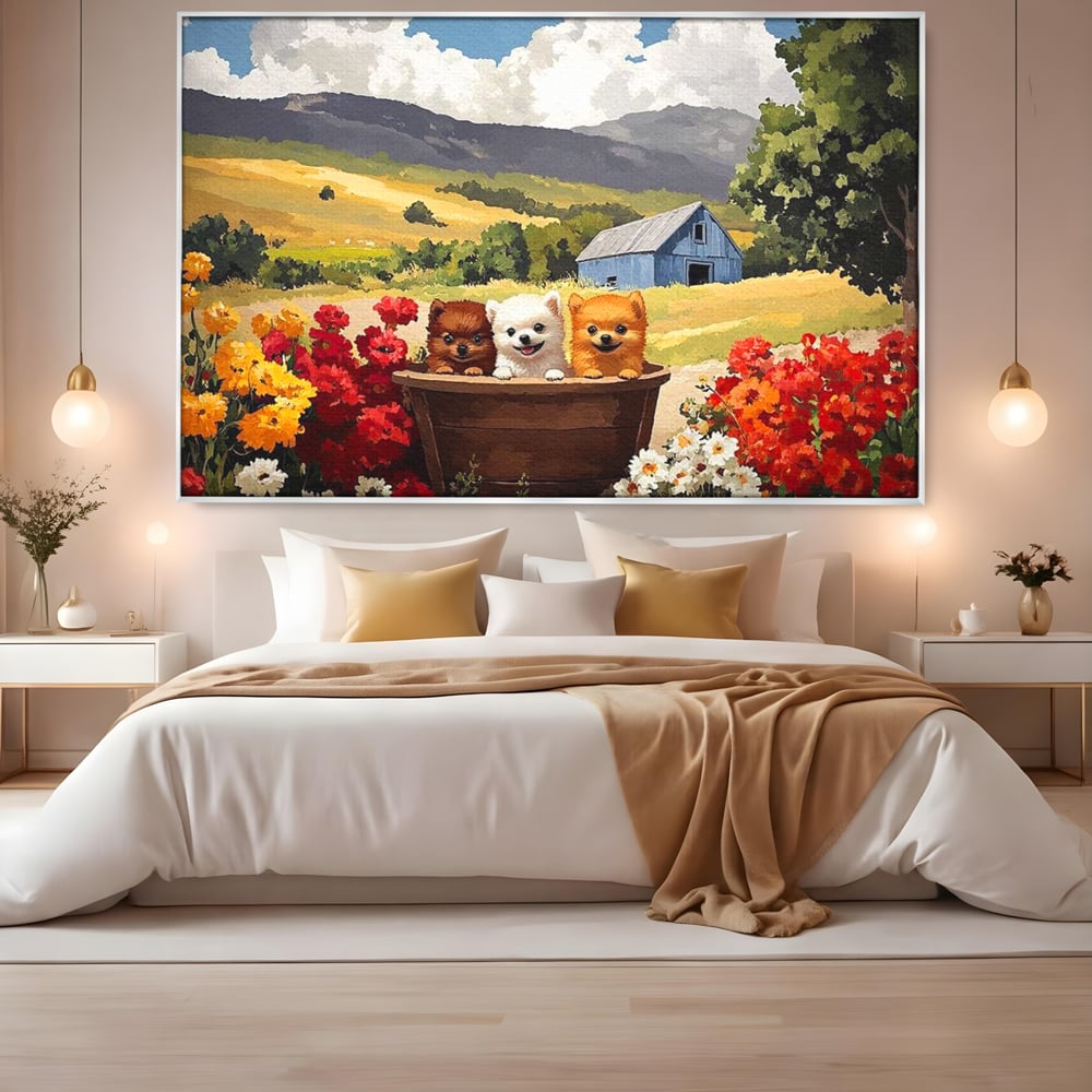 Tablou canvas cu pictura cu trei catelusi in butoi, in rama de aluminiu argintiu, pe perete intr-un dormitor